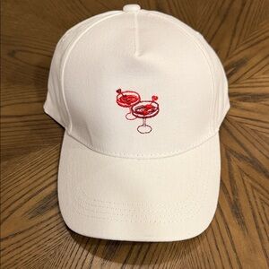 Francesca's White Cotton Baseball Cap with Black Tag Accent